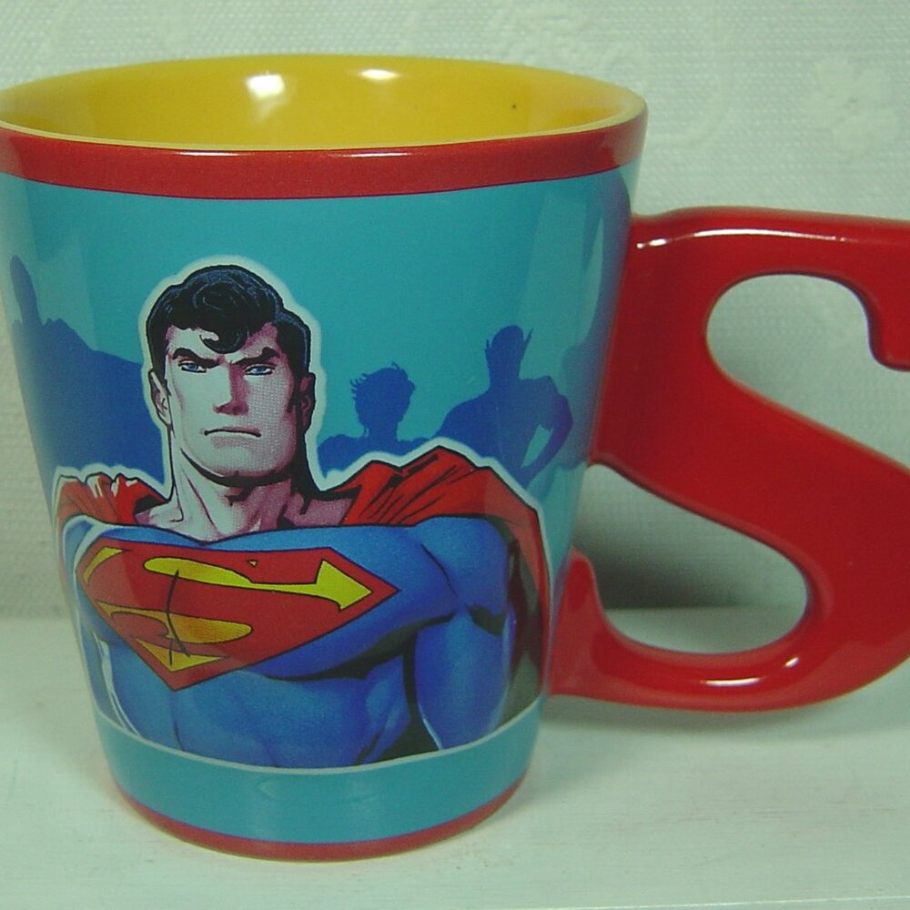 Six Flags Superman mug with letter "S" handle